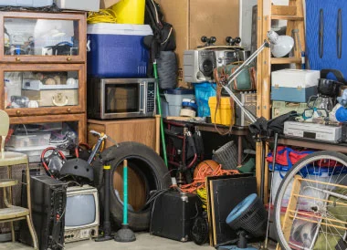 Treylers. A garage filled with junk.
